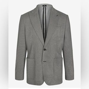 Brand new 36 S men’s blazer- sleek design in black and white. Selling for $75.